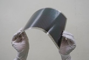Photo of Large area (703 cm2; 24.15 cm &times; 29.10 cm) film-type perovskite solar module for the world's highest conversion efficiency