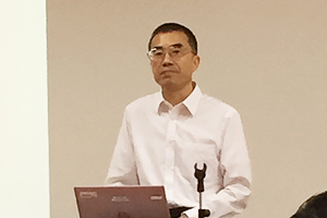 Photo of NEDO Executive Director Yoshiteru Sato delivering remarks