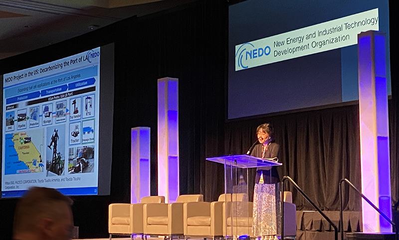 Photo of NEDO Executive Director, Dr. Iimura providing a keynote speech