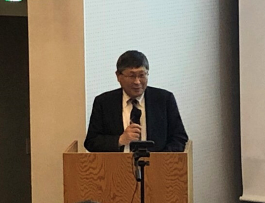 Photo of Dr. KISHIMOTO Kikuo, the Executive Director of NEDO Technology and Innovation Strategy Center, addressing the audience